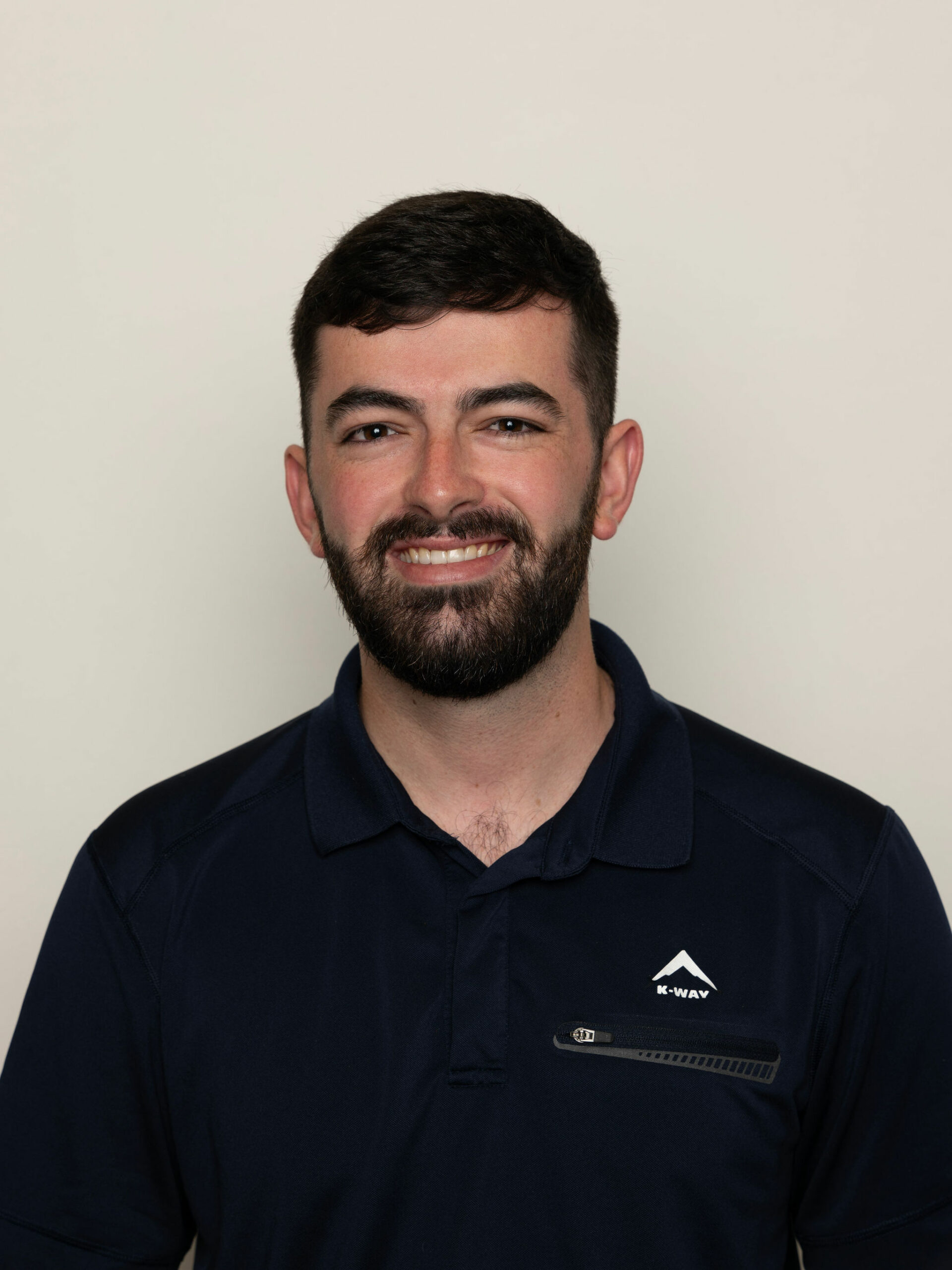 a man smiling for a picture