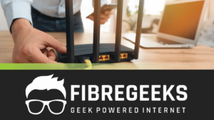 a person holding a phone and a router