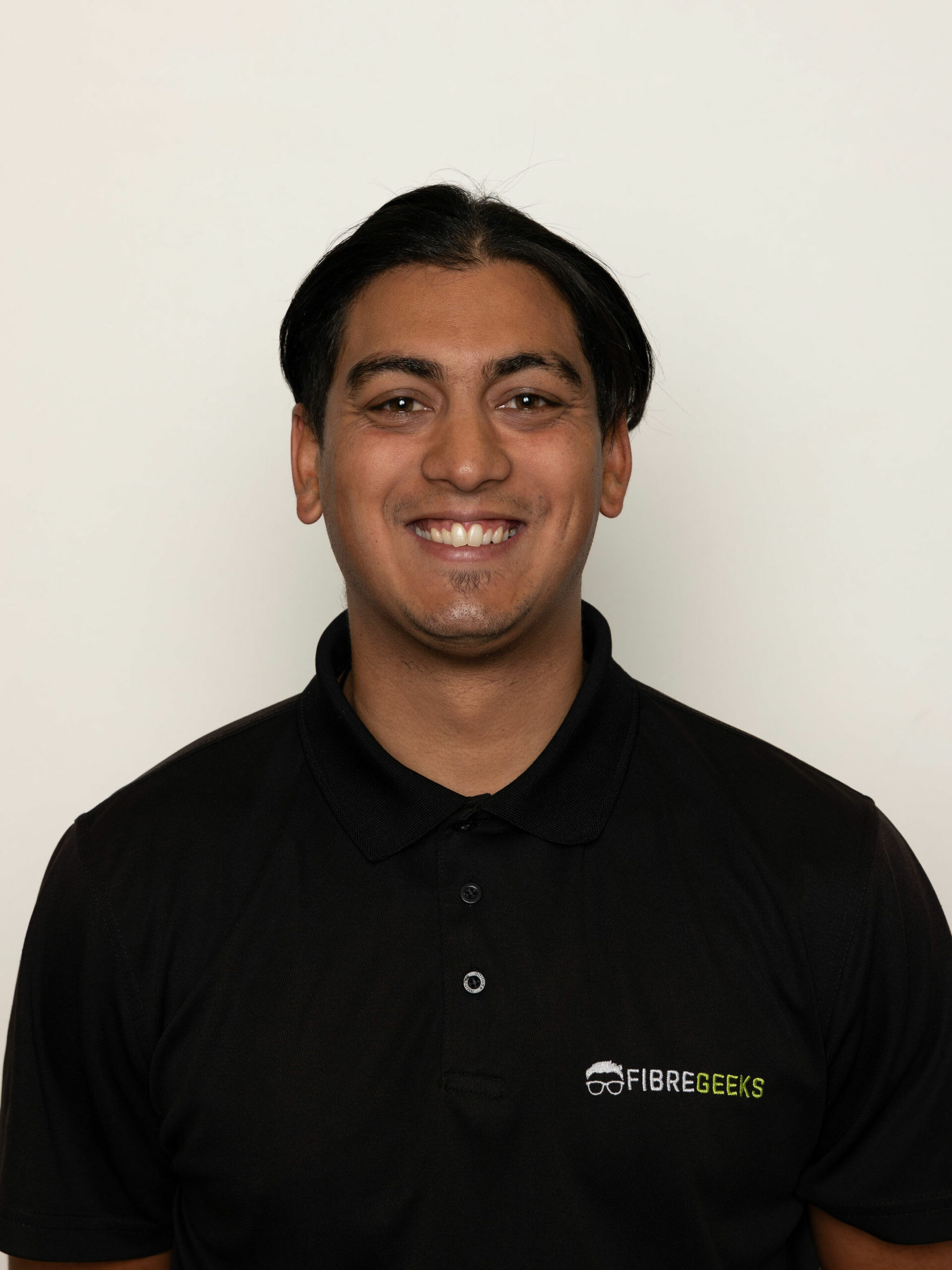 a man smiling for a picture