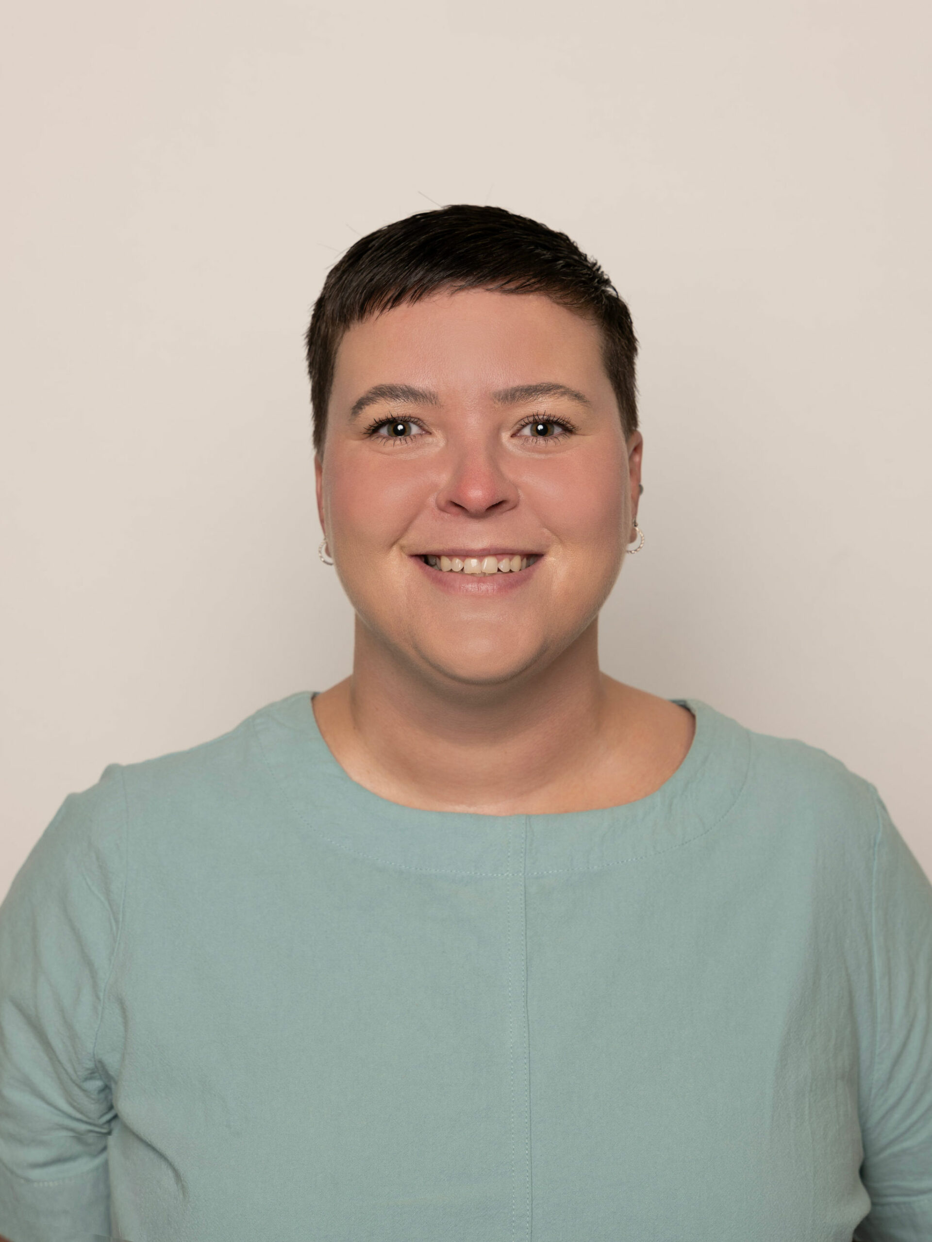 a woman smiling for a picture