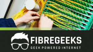 a person holding yellow cables